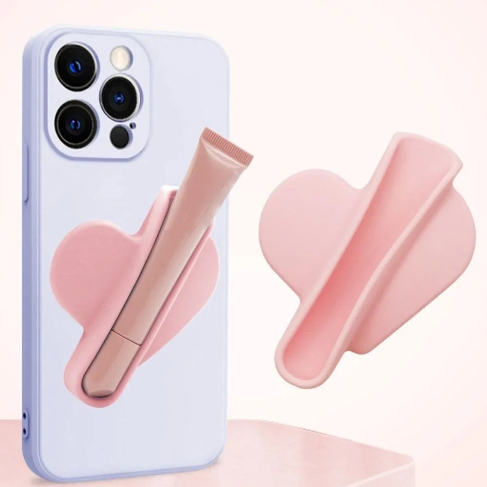 Funda de silicona para teléfono con soporte para lápiz labial de corazón 💄